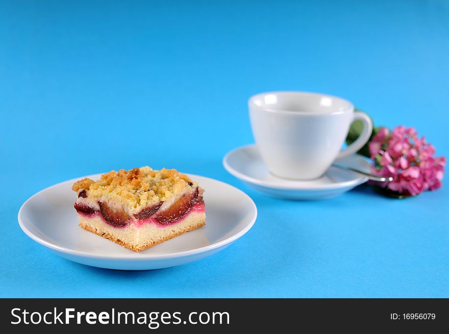 Place setting with cake and coffee