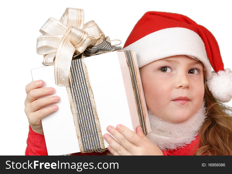 Girl in christmas hat with gift