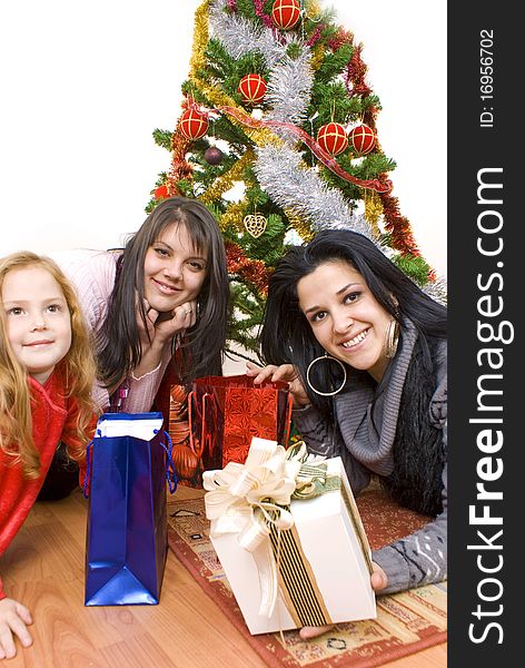 Three young happy womenwhit gift box