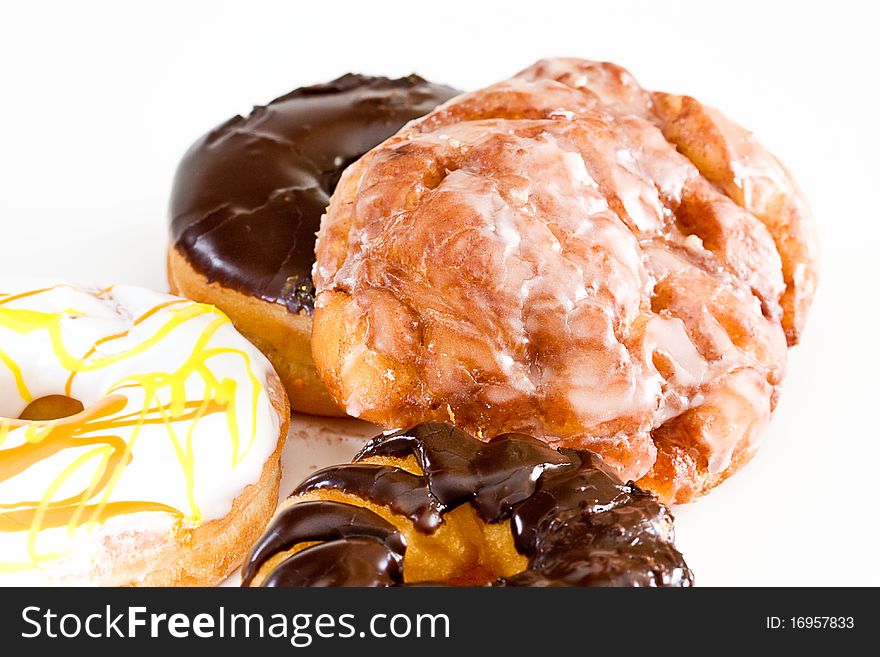 An assortment of donuts on a white background