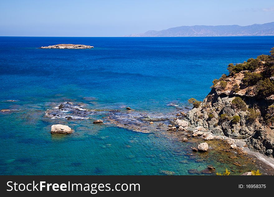 A beautiful view of sea with an island. A beautiful view of sea with an island