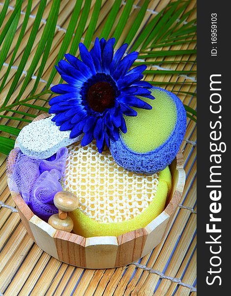 Bathroom items displayed on wooden background.