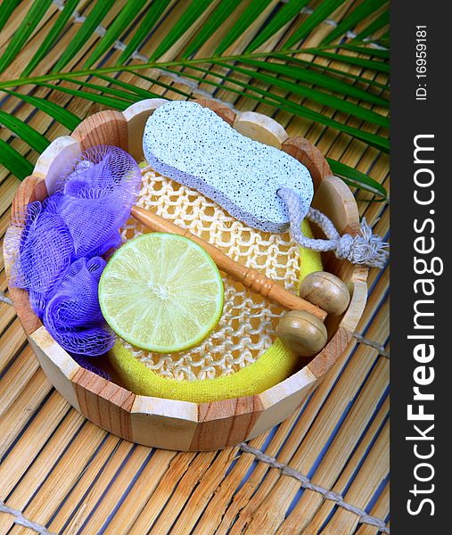 Bathroom items displayed on wooden background.