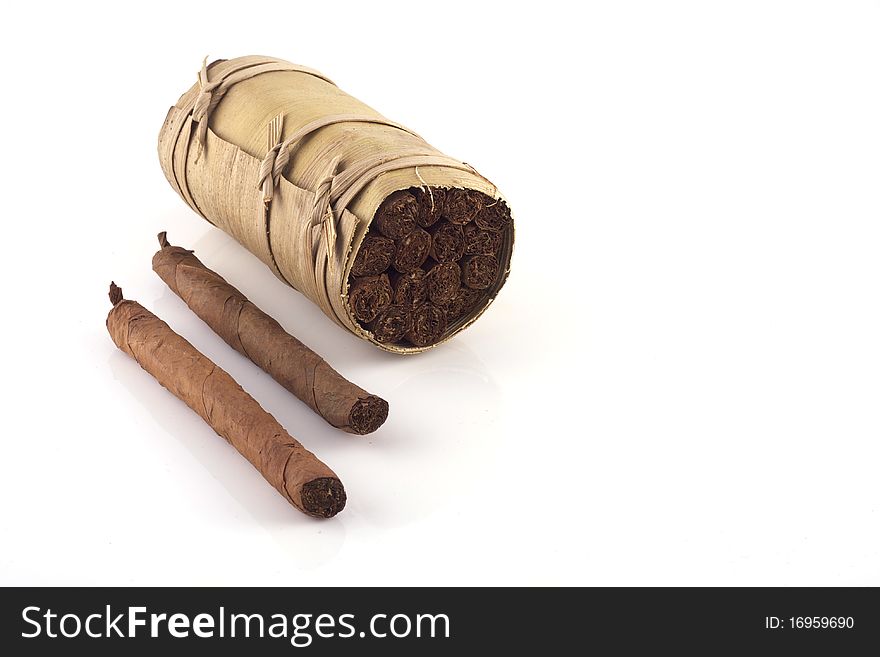 Two hand rolled cigars and a cuban humidor isolated on a white background