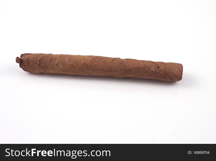 Handrolled cigar isolated on a white background