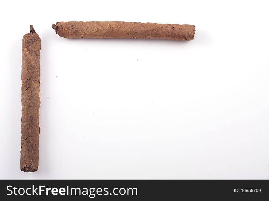 Two handrolled cigars isolated on a white background