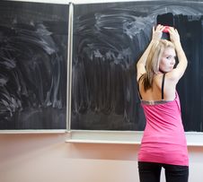 Student Erasing The Chalkboard/blackboard Stock Photography Student Erasing The Chalkboard/blackboard Stock Photography