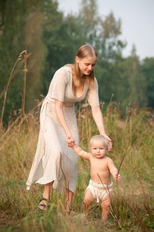 Mother Walk With Baby In Park Royalty Free Stock Photography Mother Walk With Baby In Park Royalty Free Stock Photography