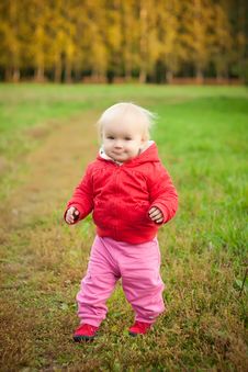 Cheerful Baby Walk On Grass Road In Park Stock Photo Cheerful Baby Walk On Grass Road In Park Stock Photo