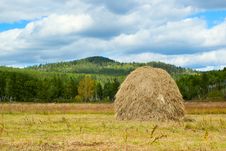 Blue Sky And Clouds Over Green Hills With Haystack Stock Images
