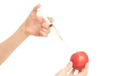 Doctor Injecting Poison To Apple Royalty Free Stock Photo Doctor Injecting Poison To Apple Royalty Free Stock Photo
