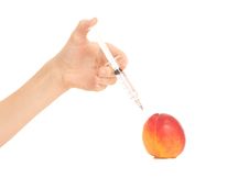 Injecting Poison To Nectarine On White Royalty Free Stock Photo Injecting Poison To Nectarine On White Royalty Free Stock Photo