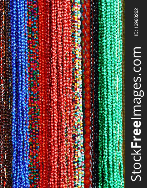Red, blue and green beads background. Red, blue and green beads background