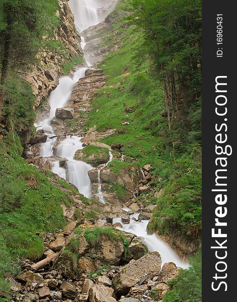 Waterfall in green nature in Switzerland