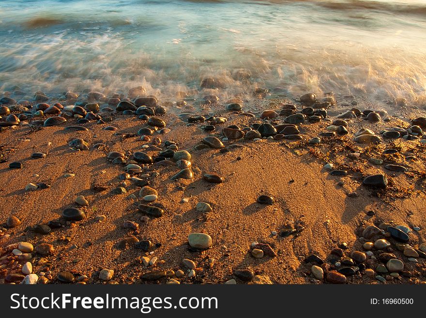 Sea with stones in nature