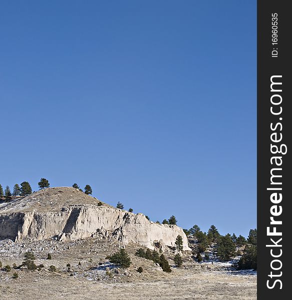 Large hill with cliffs