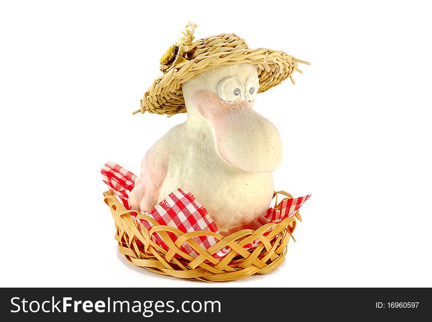 Plush Toy Duck sitting in the basket