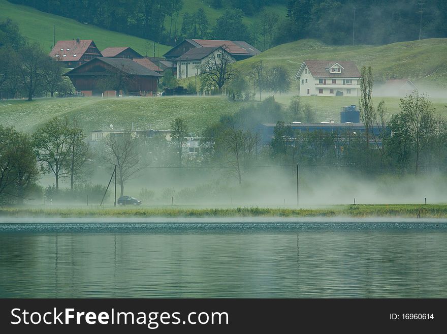 Country side view in Switzerland with fog