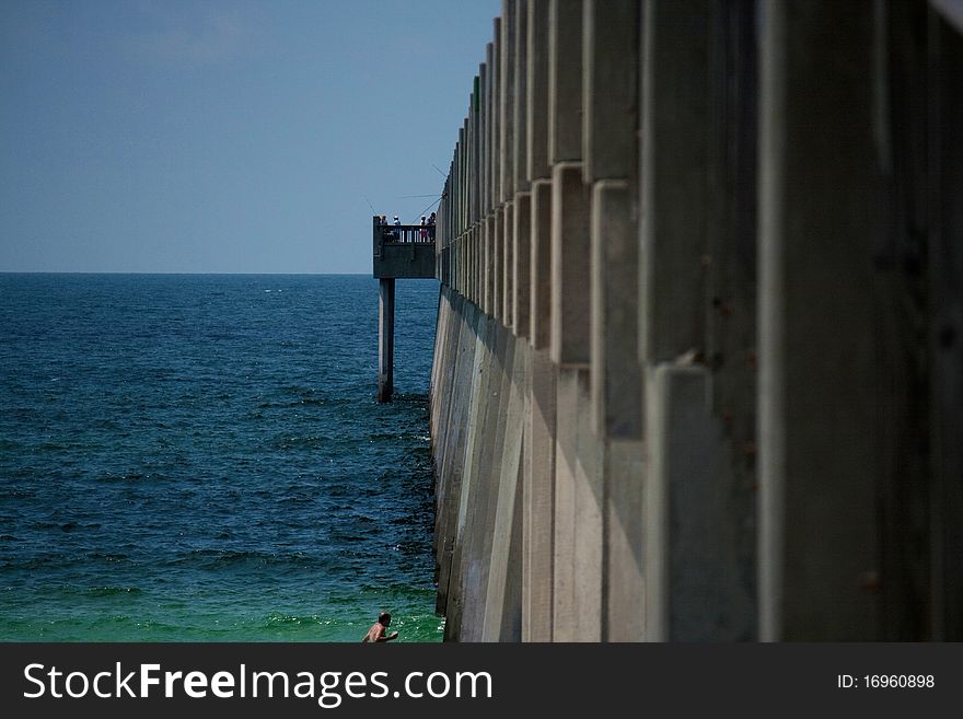 Side view of a pier over the Gulf of Mexico in Florida.