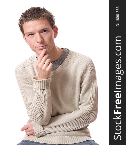 Pensive young man looking up isolated over white background. Pensive young man looking up isolated over white background