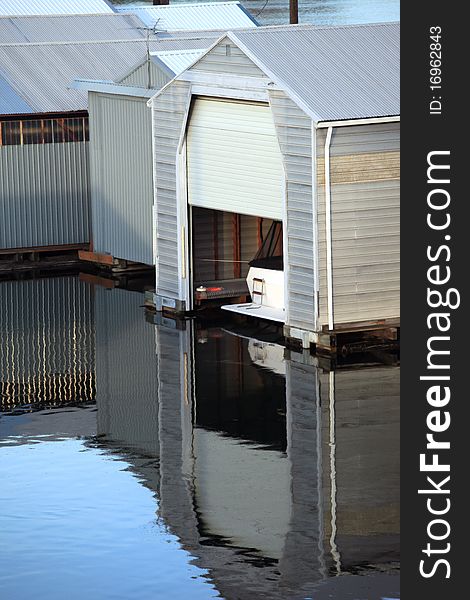 Reflection and a floating garage with a yacht inside. Reflection and a floating garage with a yacht inside.