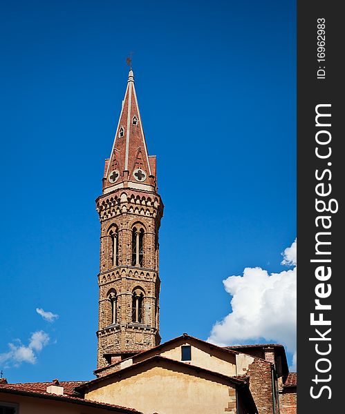 Church Steeple against a slightly cloudy, blue sky