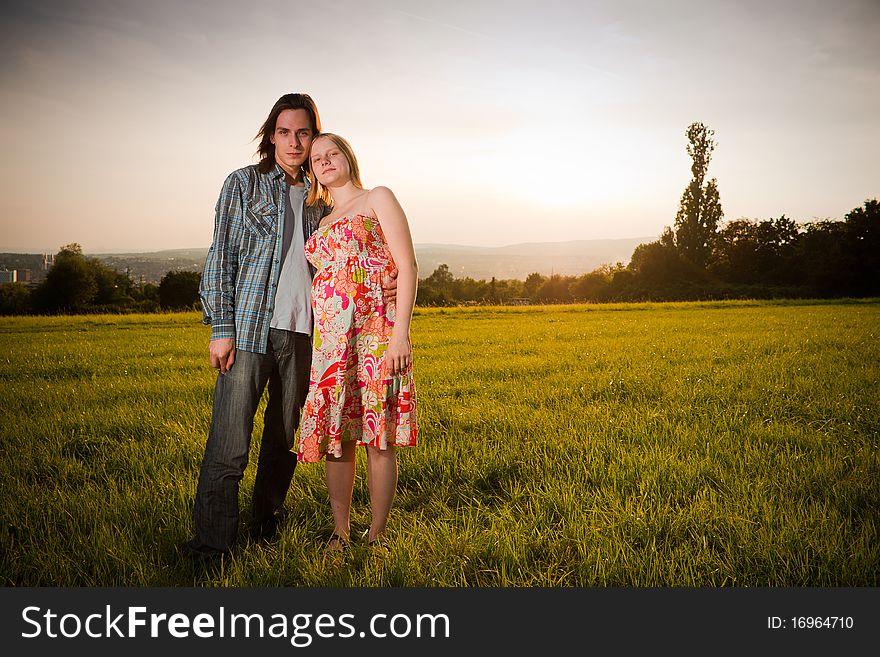 Lovely Couple Flirt In Field On Sunset