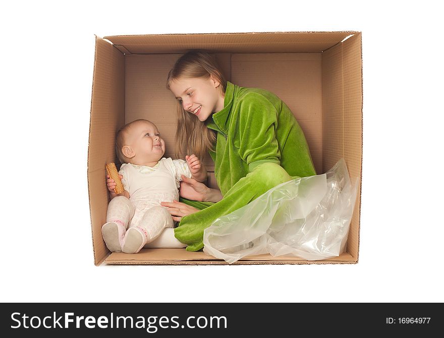 Mother Sit With Baby Eating Cookie