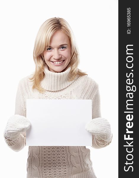 Attractive woman holding a blank white plate isolated. Attractive woman holding a blank white plate isolated