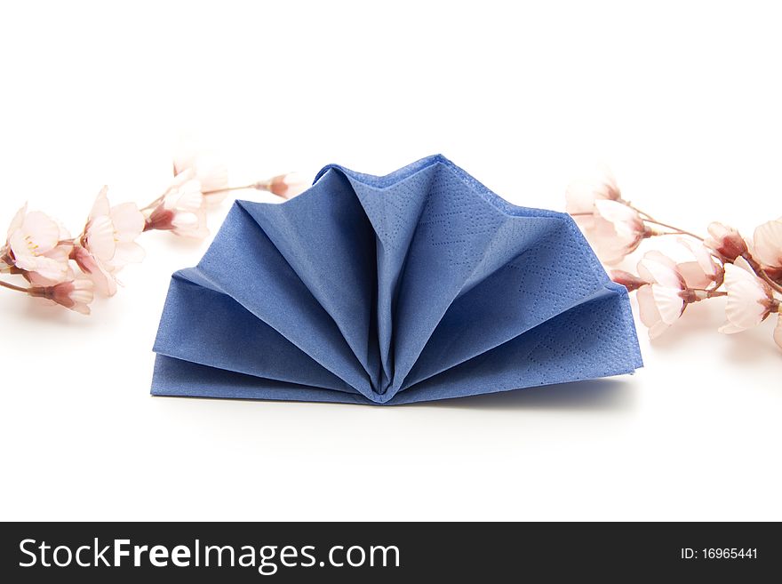 Napkin folded for the dinner table with flowers. Napkin folded for the dinner table with flowers