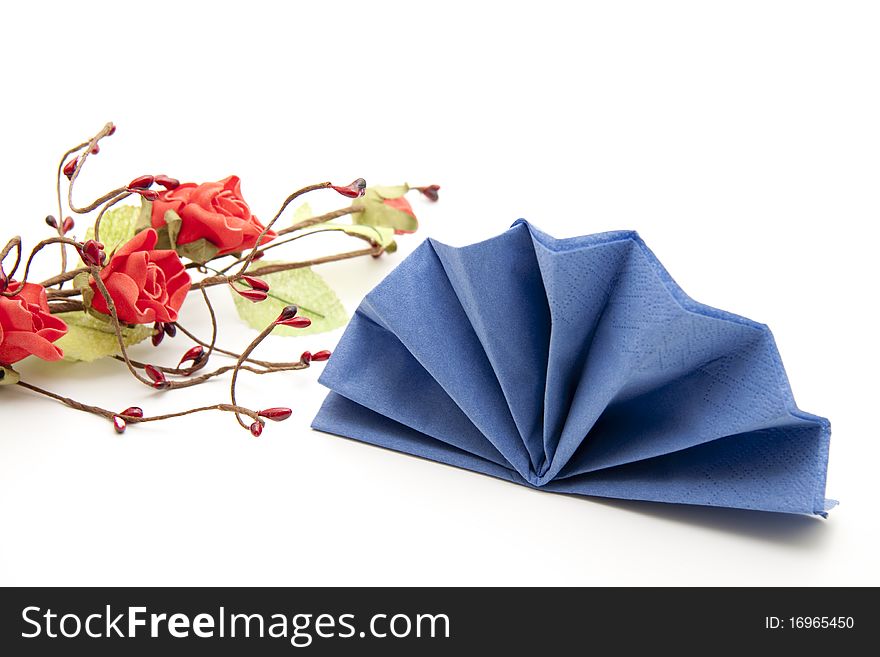 Napkin folded for the dinner table with flowers. Napkin folded for the dinner table with flowers