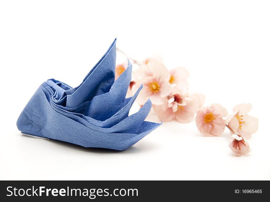 Napkin folded to the ship for the dinner table