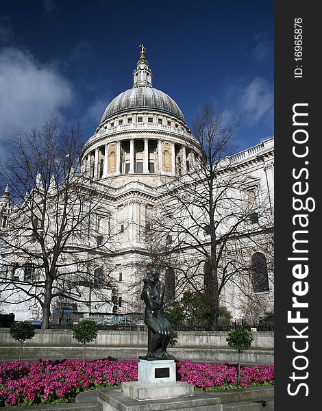 Christopher Wren's Saint Pauls Cathedral, London against a blue sky