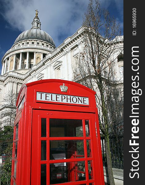 Christopher Wren's Saint Pauls Cathedral, London with a red telephone box. Christopher Wren's Saint Pauls Cathedral, London with a red telephone box