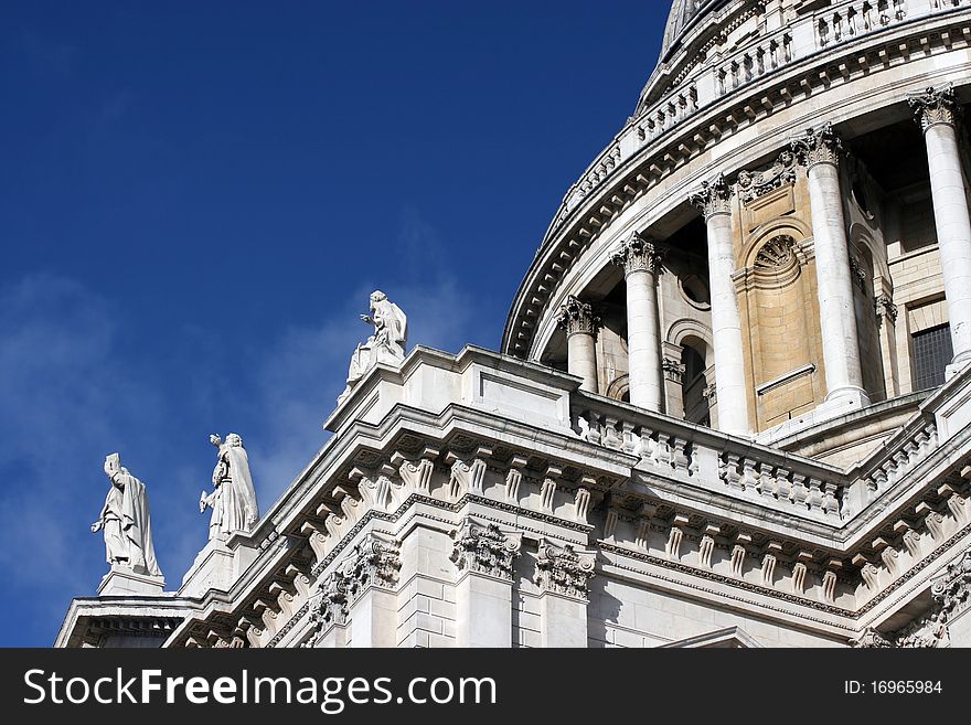 Christopher Wren's Saint Pauls Cathedral, London against a blue sky