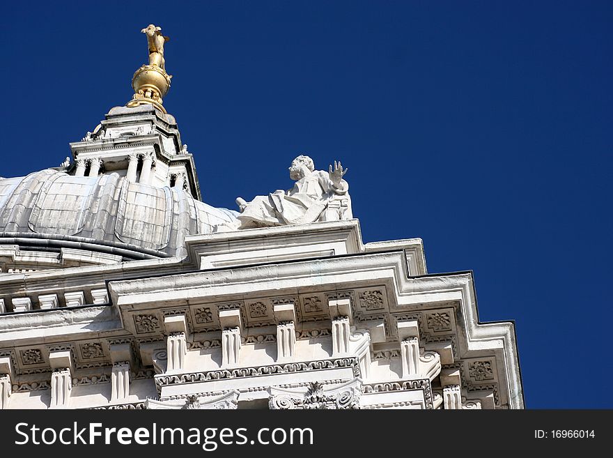 Christopher Wren's Saint Pauls Cathedral, London against a blue sky