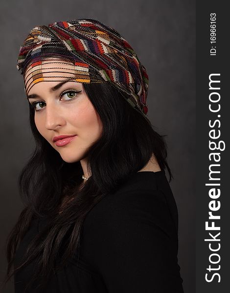 Portrait of beautiful girl in a shawl