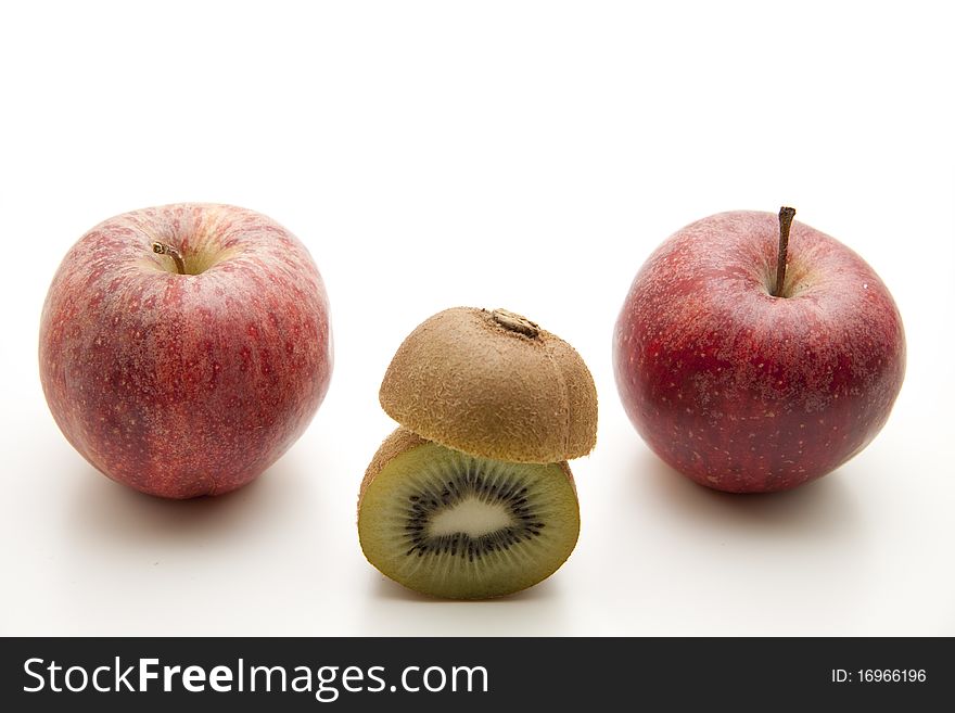 Kiwi halves and with apple. Kiwi halves and with apple