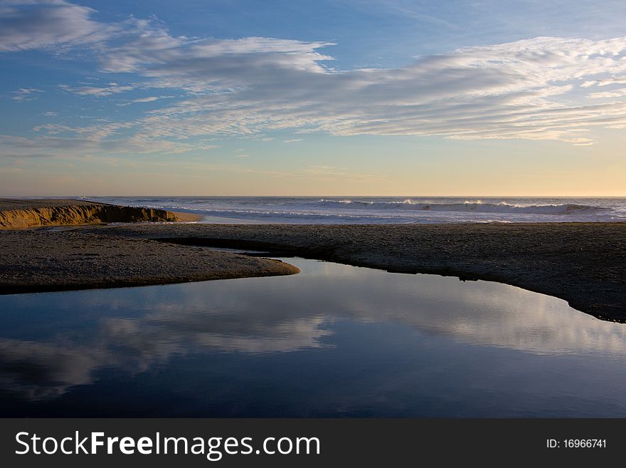 Pacific ocean shore in evening