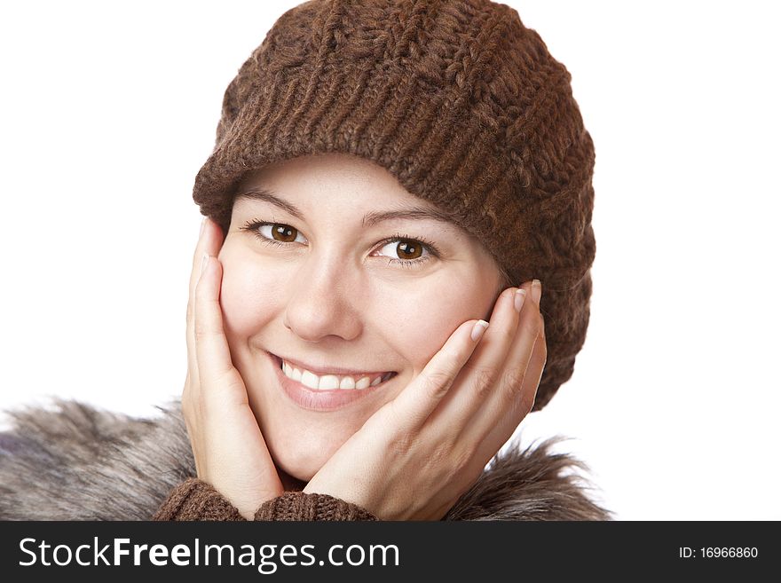 Beautiful woman with hands on face  smiles happy