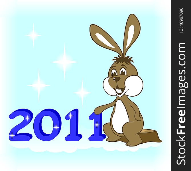 The New Year's rabbit sits on a stub. He has put a paw on a figure of 2011. The New Year's rabbit sits on a stub. He has put a paw on a figure of 2011.