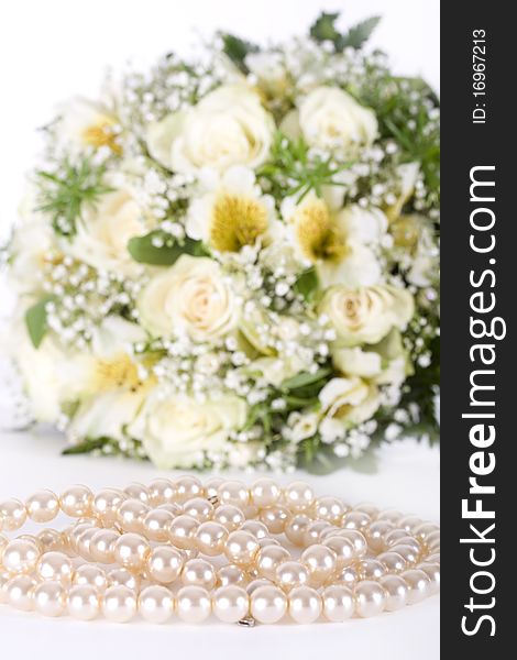 Wedding bouquet with white flowers at white background