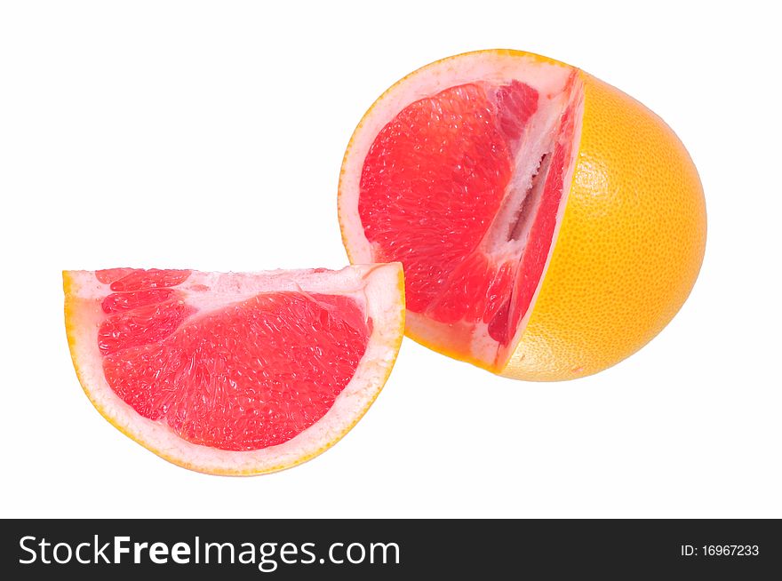 Juicy grapefruit, cut into two unequal parts on a white background isolated. Juicy grapefruit, cut into two unequal parts on a white background isolated.