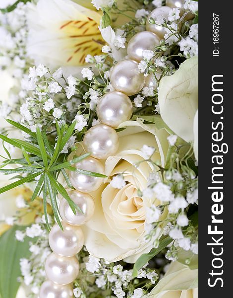 Wedding bouquet very close-up with white pearls