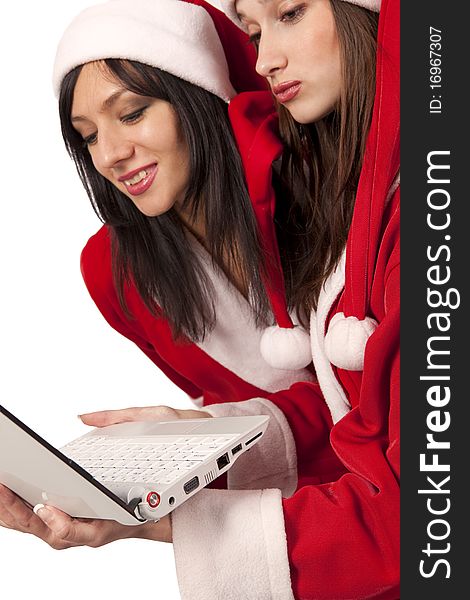 Two santa girls with laptop