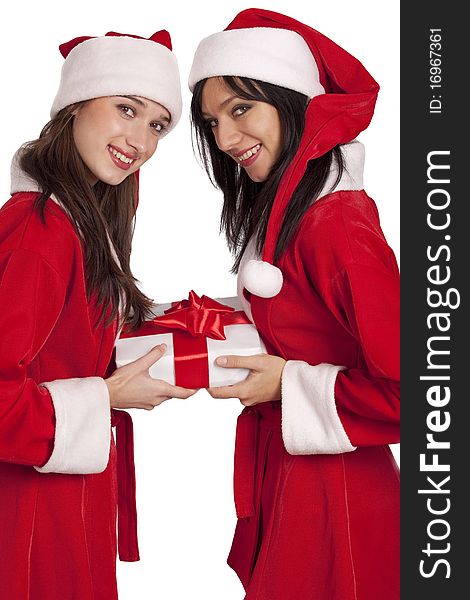 Young women in Santa costume with christmas gift isolated on white. Young women in Santa costume with christmas gift isolated on white