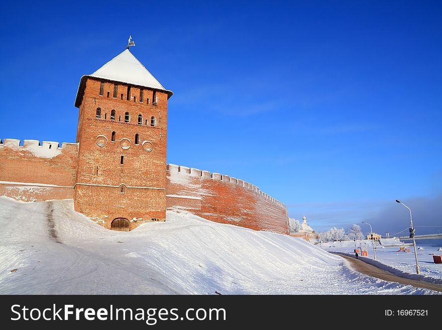 Ancient brick fortress on the snow hill. Ancient brick fortress on the snow hill