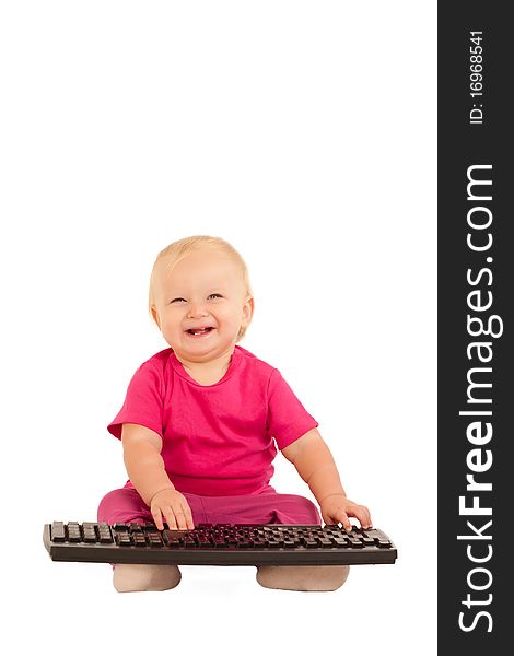 Cute cheerful girl typing on computer keyboard on white