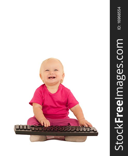 Cute cheerful girl typing on computer keyboard on white