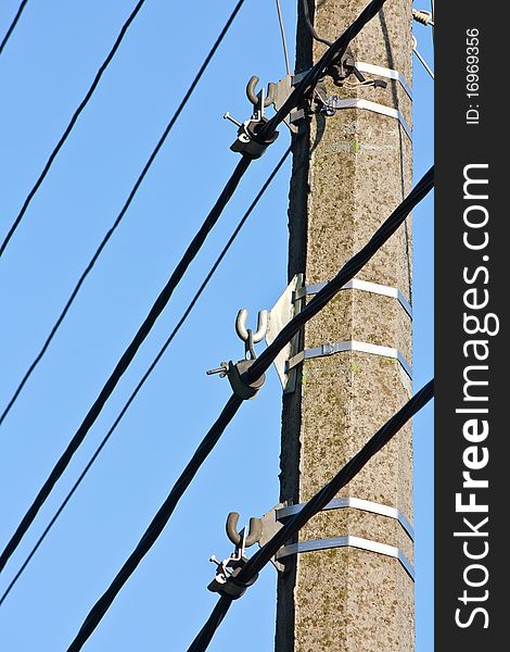 Pole with mountings, electric cables and wires. Pole with mountings, electric cables and wires